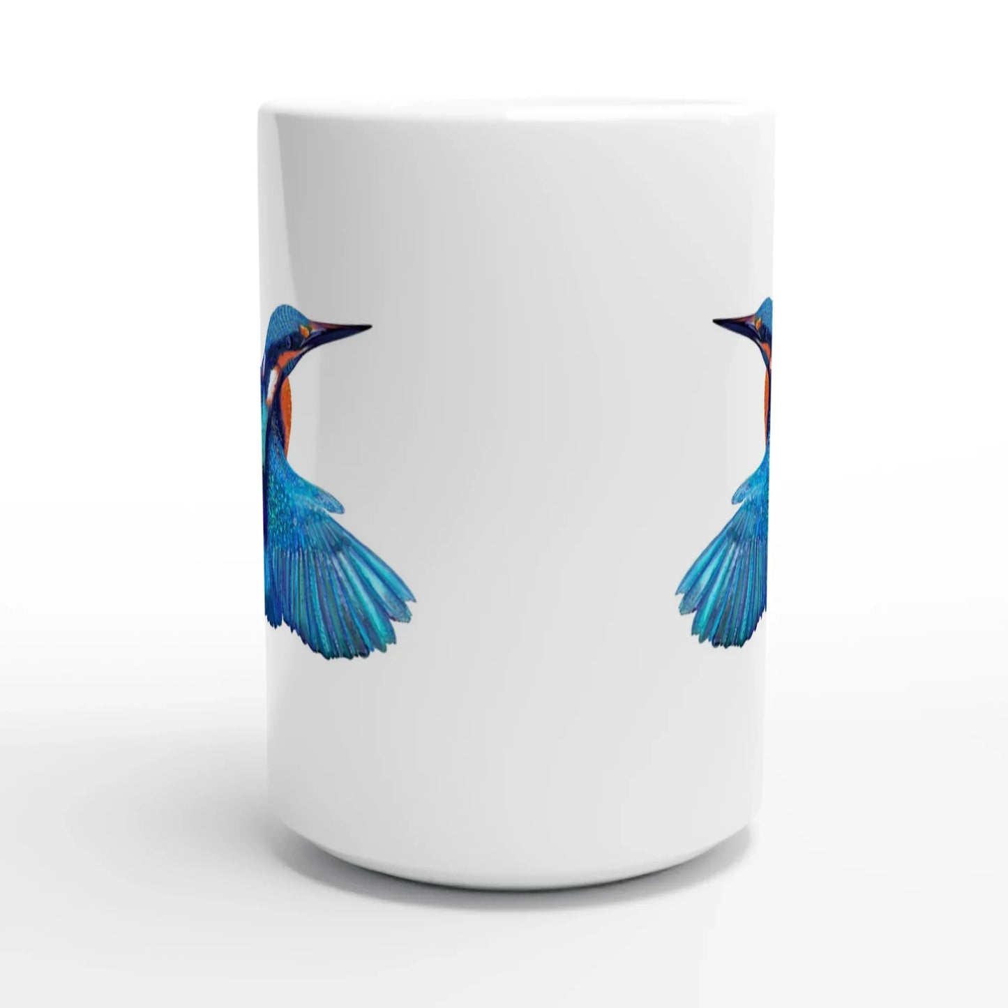 White mug featuring vibrant kingfisher bird artwork in flight, showcasing blue and orange plumage details.