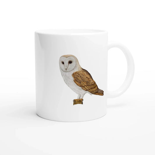White ceramic mug featuring a detailed barn owl illustration, perfect for wildlife art lovers.